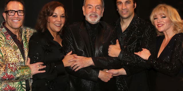 Neil Diamond pictured backstage with director Michael Mayer; Will Swenson, who plays Diamond; Robyn Hurder, who portrays Diamond's second wife Marcia Murphey; and Linda Powell, who plays the doctor.