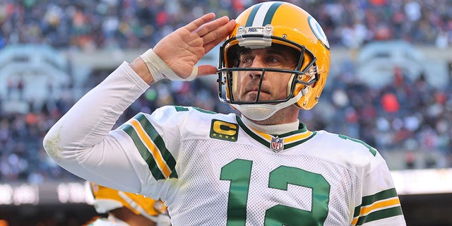 Aaron Rodgers of the Green Bay Packers celebrates after a successful two-point conversion against the Chicago Bears during the fourth quarter at Soldier Field Dec. 4, 2022, in Chicago. 
