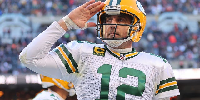 Aaron Rodgers of the Green Bay Packers celebrates after a successful two-point conversion against the Chicago Bears during the fourth quarter at Soldier Field Dec. 4, 2022, in Chicago.