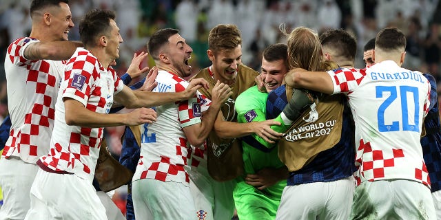 Croatia players celebrate their win via a penalty shootout during the FIFA World Cup Qatar 2022 quarterfinal match between Croatia and Brazil at Education City Stadium on Dec. 9, 2022 in Al Rayyan, Qatar.