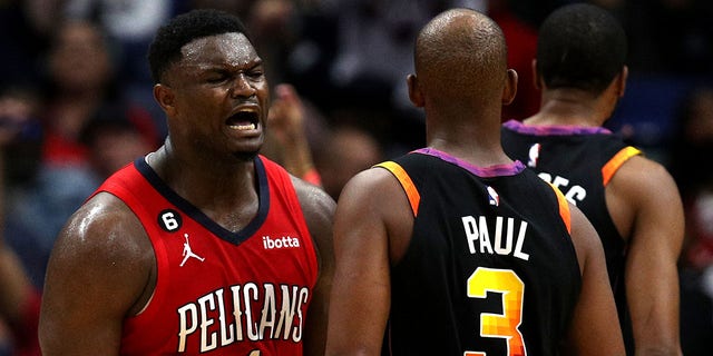 Zion Williamson, #1 of the New Orleans Pelicans, reacts after dunking the ball during the second quarter of an NBA game against the Phoenix Suns at Smoothie King Center on December 9, 2022, in New Orleans, Louisiana. 