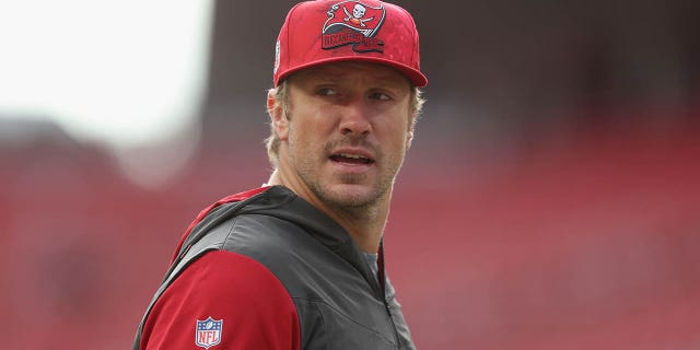 Tampa Bay Buccaneers number 11 Blaine Gabbert warms up before the game against the San Francisco 49ers at Levi's Stadium on December 11, 2022 in Santa Clara, California.