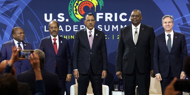 (L-R) President of Mozambique Filipe Nyusi, President of Somalia Hassan Sheikh Mohamud, President of Niger Mohamed Bazoum, U.S. Defense Secretary Lloyd Austin and U.S. Secretary of State Antony Blinken arrive for the Peace, Security, and Governance Forum during the U.S.-Africa Leaders Summit Dec. 13, 2022, in Washington, D.C. 