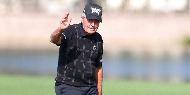 Gary Player waves to the crowd before the PNC Championship at Ritz-Carlton Golf Club on Dec. 16, 2022, in Orlando, Florida.