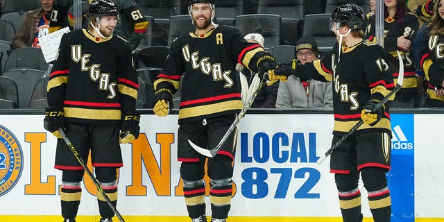 Alex Pietrangelo, #7, Jonas Rondbjerg, #46, and Jake Leschyshyn, #15 of the Vegas Golden Knights, warm up prior to the game against the New York Islanders at T-Mobile Arena on Dec. 17, 2022 in Las Vegas.