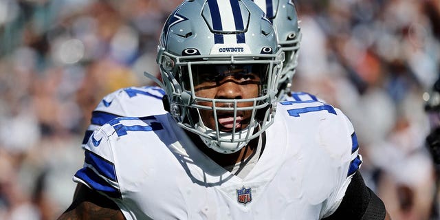 Micah Parsons #11 of the Dallas Cowboys celebrates after a play against the Jacksonville Jaguars during the first half of the game at TIAA Bank Field on December 18, 2022 in Jacksonville, Florida.