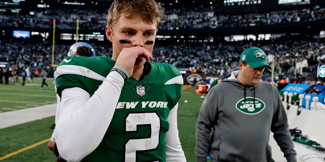 Zach Wilson #2 of the New York Jets reacts after a game against the Detroit Lions at MetLife Stadium on December 18, 2022 in East Rutherford, New Jersey.