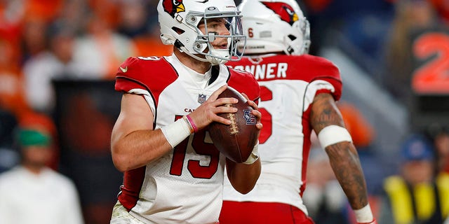 Trace McSorley (19) of the Arizona Cardinals looks to pass during the fourth quarter of a game against the Denver Broncos at Empower Field At Mile High Dec. 18, 2022, in Denver, Colo. 