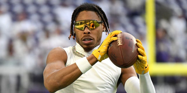 Justin Jefferson, #18 of the Minnesota Vikings, warms up against the New York Giants at U.S. Bank Stadium on December 24, 2022, in Minneapolis, Minnesota. 