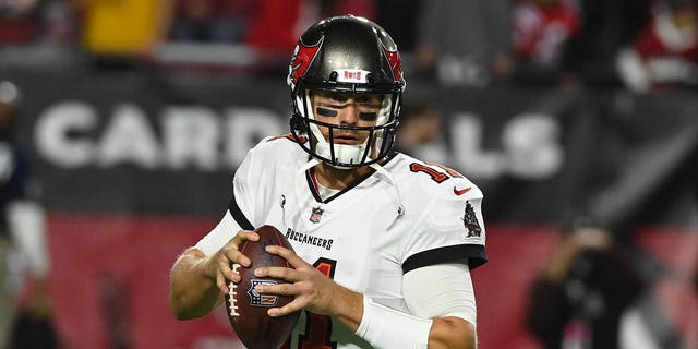 Blaine Gabbert, #11 of the Tampa Bay Buccaneers, prepares for a game against the Arizona Cardinals at State Farm Stadium on Dec. 25, 2022 in Glendale, Arizona.