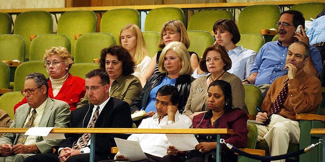 People identified as some of the family members of those killed in the 1988 bombing of a Pan Am jet over Lockerbie, Scotland, watch a meeting of the United Nations Security Council, September 9, 2003, at UN headquarters in New York. 