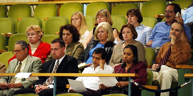 People identified as some of the family members of those killed in the 1988 bombing of a Pan Am jet over Lockerbie, Scotland, watch a meeting of the United Nations Security Council, September 9, 2003, at UN headquarters in New York.