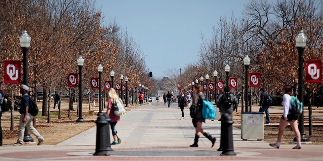 Students walk on campus between clases at the University of Oklahoma on March 11, 2015 in Norman, Oklahoma. 