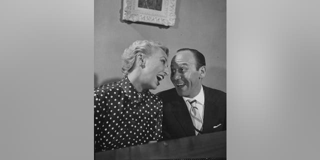 Songwriter Frank Loesser (right) and his wife, Lynn Garland, (left) reportedly sang "Baby, It's Cold Outside" to entertain party guests who attended their 1944 housewarming gathering in New York City.