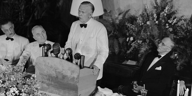 Former Secretary of State George C. Marshall (at the podium) speaks on the second anniversary of his address at Harvard University, in which he outlined the Marshall Plan for the economic recovery of Europe.