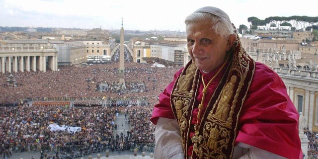 The late Pope Benedict XVI, Cardinal Joseph Ratzinger of Germany, appears on the balcony of St. Peter's Basilica in Vatican City after being elected by the conclave of cardinals, April 19, 2005.