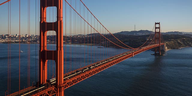 The Golden Gate Bridge is awash in warm light from the setting sun in San Francisco, California, on Feb. 13, 2015.