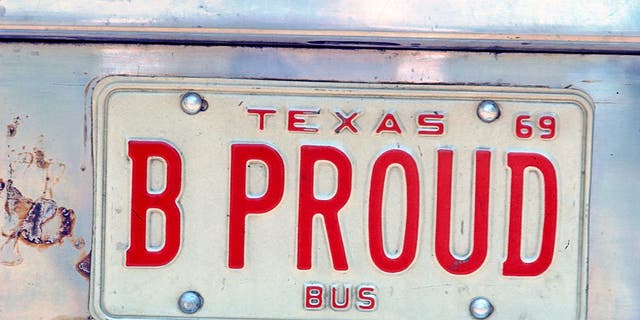 "Godfather of Soul" James Brown's Texas license plate on his tour bus reads "B Proud" at the Newport Jazz Festival on July 6, 1969, in Newport, Rhode Island.