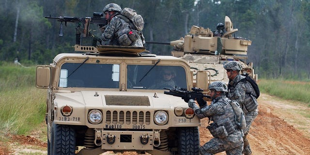 Members of the U.S. Army's 3rd Infantry Division, 4th Brigade Combat Team train during a live fire exercise prior to their deployment to Iraq on Sept. 5, 2007, in Fort Stewart, Georgia.