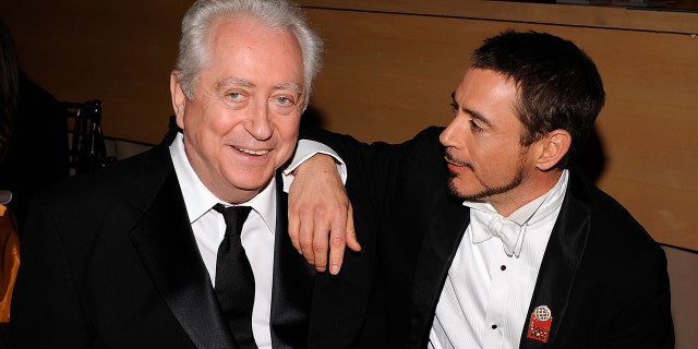 Robert Downey Jr. says he feels like he's still working for his dad.