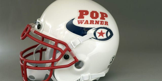 Pop Warner Football: A close-up of the youth helmets and equipment in the Time&Life building in New York.