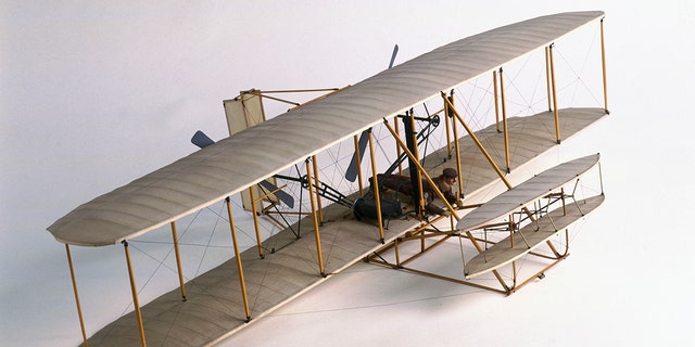 A replica of the Wright brothers' first controlled and powered flight on Dec. 17, 1903, in Kitty Hawk, North Carolina.