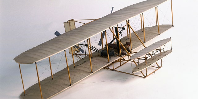 A replica of the Wright brothers' first controlled and powered flight on Dec. 17, 1903, in Kitty Hawk, North Carolina.