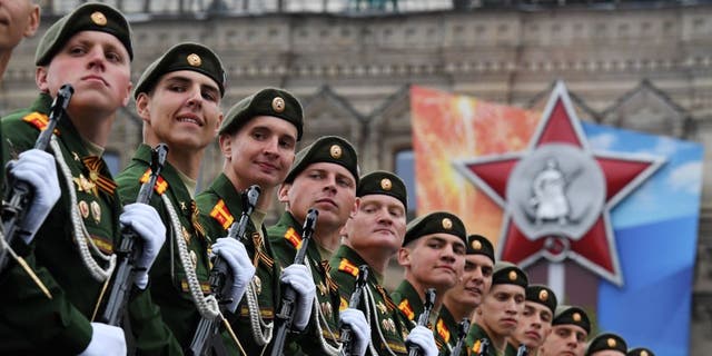 Russian servicemen march at Red Square during the general rehearsal of the Victory Day military parade in Moscow on May 6, 2018. - Russia marks the 73rd anniversary of the Soviet Union's victory over Nazi Germany in World War Two on May 9. (KIRILL KUDRYAVTSEV/AFP via Getty Images)