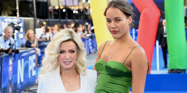 Donna Mills and daughter Chloe attend UK premiere "No" 28 July 2022 at Odeon Luxe Leicester Square, London. 