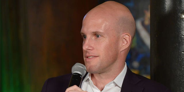 Grant Wahl speaks on a panel discussion at the 2014 Kicking + Screening Soccer Film Festival New York, presented by Budweiser, on April 8, 2014, in New York City. 
