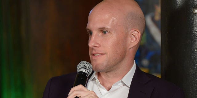 Grant Wahl speaks on a panel discussion at the 2014 Kicking + Screening Soccer Film Festival New York, presented by Budweiser, on April 8, 2014 in New York City. 