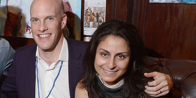 Football journalist Grant Wahl with his wife Dr Céline Gounder.