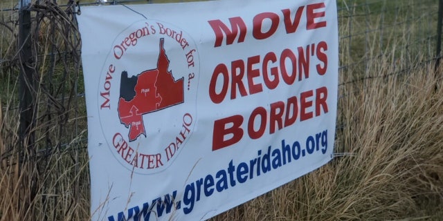 A rural sign advertises the Greater Idaho movement.