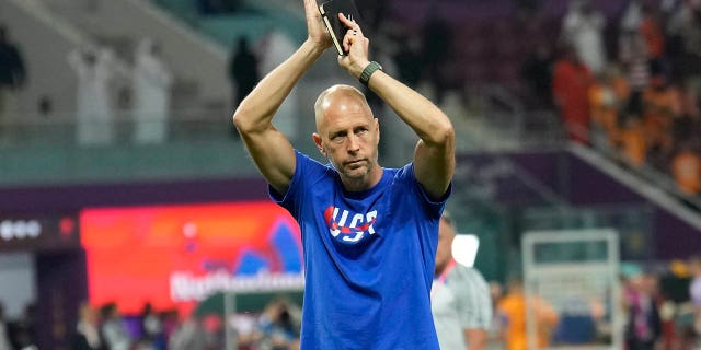 Gregg Berhalter walks off the field