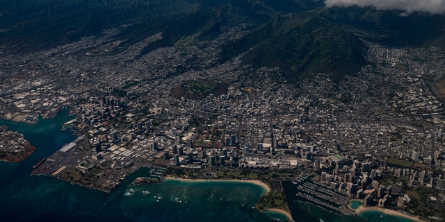 An aerial view of Ala Moana Beach Pack and Honolulu from a United Airlines flight out of Los Angeles International Airport flying over the island of Oahu on approach to Daniel K. Inouye International Airport on Wednesday, June 23, 2021, in Honolulu, Hawaii.