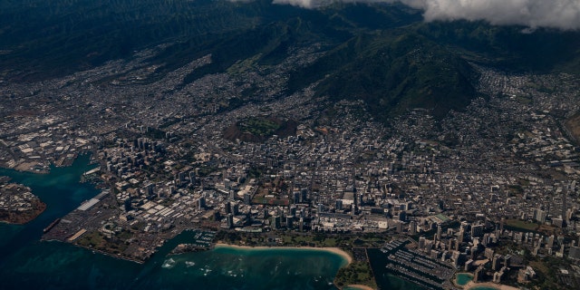 An aerial view of Ala Moana Beach Pack and Honolulu from a United Airlines flight out of Los Angeles International Airport flying over the island of Oahu on approach to Daniel K. Inouye International Airport on Wednesday, June 23, 2021, in Honolulu, Hawaii.