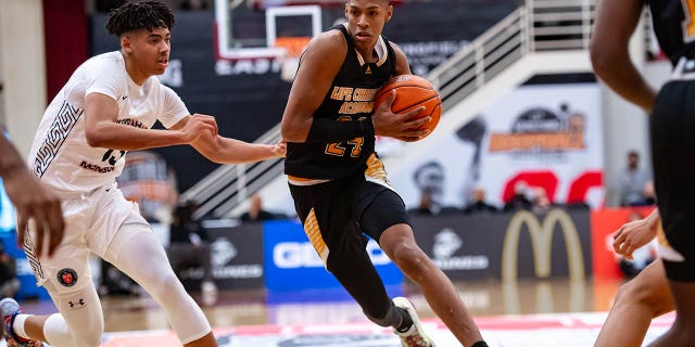 Hansel Emmanuel of Life Christian Academy drives against Wilbraham and Monson Academy on Jan. 17, 2022, in Springfield, Massachusetts.