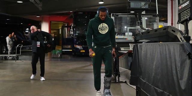 BROOKLYN, NY - DECEMBER 12: Dejounte Murray, #5 of the Atlanta Hawks, arrives at the arena prior to the game against the Brooklyn Nets on December 12, 2022, at Barclays Center in Brooklyn, New York.