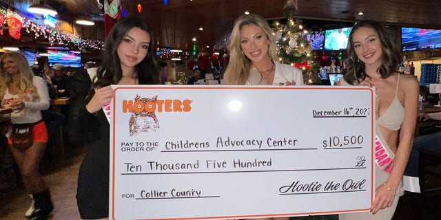 Grace Burchett participated in a calendar tour where $10,500 was presented to Children's Advocacy Center of Collier County, Florida, along with books and stuffed animals. 