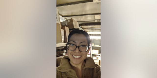 Grace Hsia Haberl works on the preloading of a package truck in Ypsilanti, Michigan, where she started her UPS career. Hsia Haberl said she got the job at UPS — loading three to five brown trucks a day with 200-400 packages a day in each — to help make ends meet at Warmilu.
