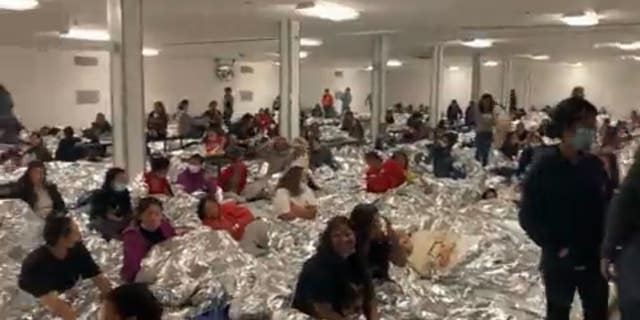In a video taken Friday from Rep. Tony Gonalez, R-Tex., a Border Patrol Central Processing Center is seen at over four times its capacity with migrants.