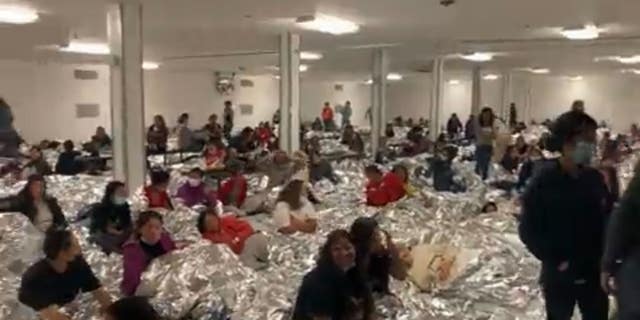 In a video taken Friday from Rep. Tony Gonalez, R-Tex., a Border Patrol Central Processing Center is seen at over four times its capacity with migrants.