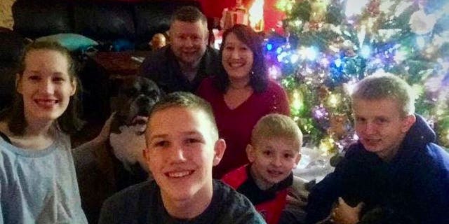 Ken DeLand, an American college student missing in France, is seen in family Christmas photo. 