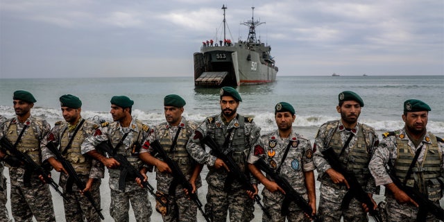 Iranian soldiers take part in an annual military drill in the coast of the Gulf of Oman and near the strategic Strait of Hormuz, in Jask, Iran on Dec. 30, 2022.