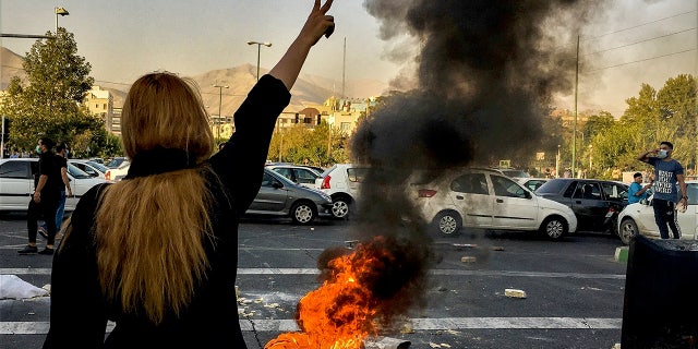 In this photo taken by an individual not employed by the Associated Press and obtained by the AP outside Iran, Iranians protest in Tehran on Oct. 1, 2022.