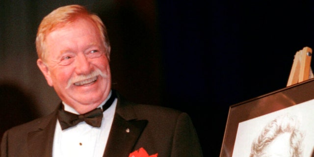 FILE - Retired Air Force Col. Joseph W. Kittinger Jr., smiles during his induction into the Aviation Hall of Fame, Saturday, July 19, 1997, in Dayton, Ohio. Kittinger, the U.S. Air Force pilot who held the record for the highest parachute jump for more than 50 years, died Friday, Dec. 9, 2022, in Florida at age 94.