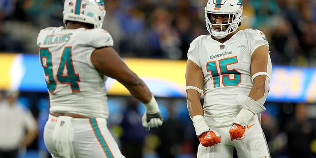 Jaelan Phillips, #15 of the Miami Dolphins, celebrates a sack in the second quarter during a game against the Los Angeles Chargers at SoFi Stadium on Dec. 11, 2022 in Inglewood, California.