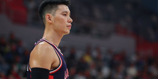 Jeremy Lin reacts during the Chinese Basketball Association game