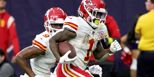 Jerick McKinnon, #1 of the Kansas City Chiefs, rushes for a touchdown during overtime against the Houston Texans at NRG Stadium on Dec. 18, 2022 in Houston.