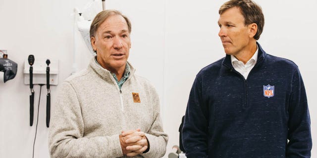 NFL Medical Adviser Dr. Jim Ellis, left, and NFL Chief Medical Officer Dr. Allen Sills brief health and safety staffs at the recent NFL game in London.